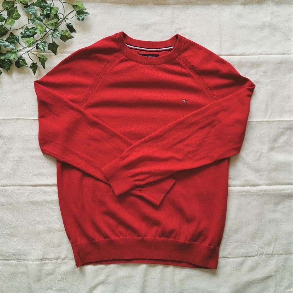 Tommy Hilfiger red long-sleeve sweatshirt.